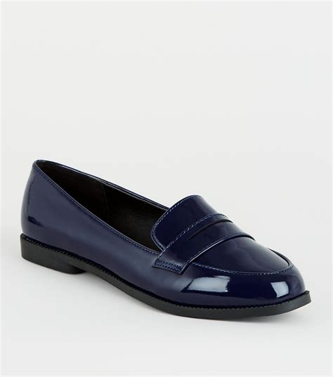 navy patent loafers